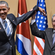Cuban President Raúl Castro (right) raises U.S. President Barack Obama's hand during a meeting at the Revolution Palace in Havana on March 21, 2016.
NICHOLAS KAMM/AFP/Getty Images